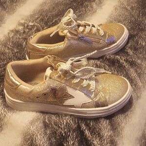 Shiny gold sneakers
